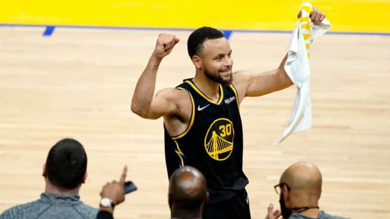 Golden State Warriors' Stephen Curry wins the inaugural Magic Johnson Western Conference MVP award