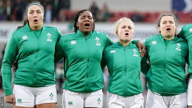 Nichola Fryday, Linda Djougang, Neve Jones and Christy Haney sing Ireland's Call before the game against Scotland in Belfast on 30 April