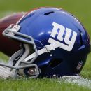 Marcus McKethan, New York Giants' rookie offensive lineman, injures his knee during the season-ending game