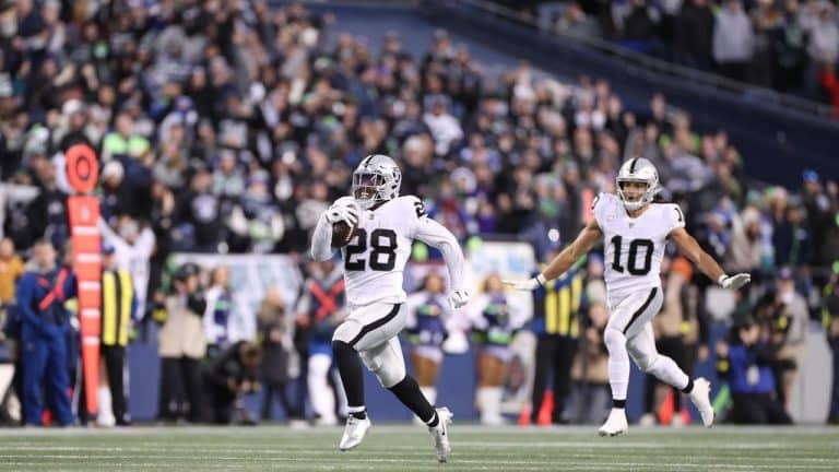 Raiders' Josh Jacobs wraps 300-yard game with a walk-off touchdown in OT